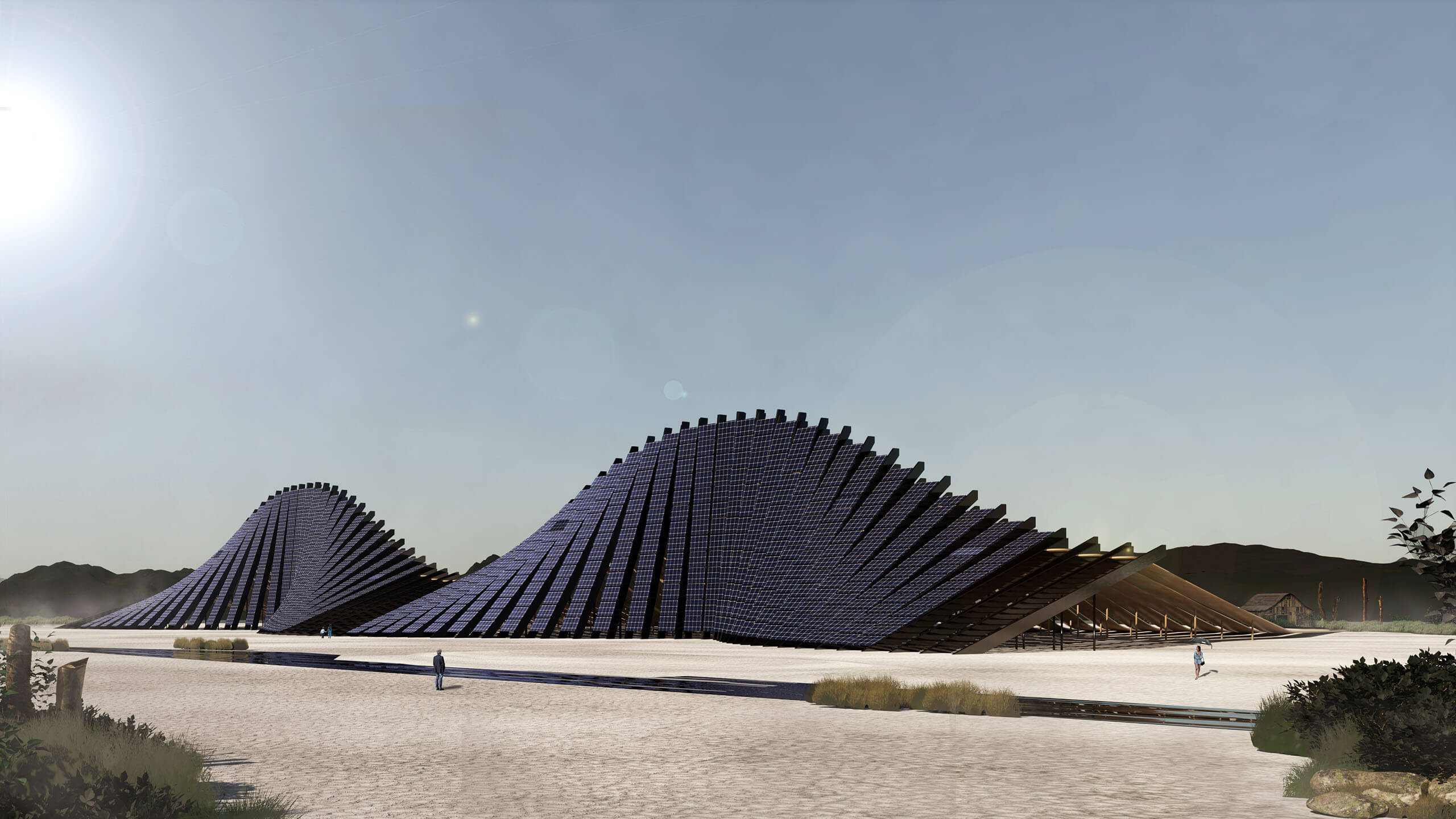 an undulating structure in the middle of the desert