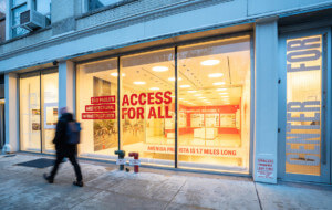 Exterior of a glass storefront with the Center For Architecture written on the front