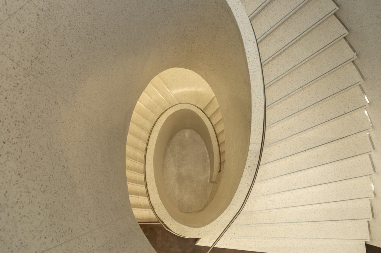 looking down a curving staircase
