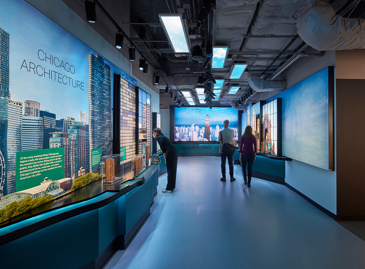 people walk through an interactive exhibition detailing chicago architectural history