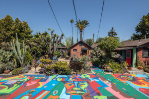 a colorful street mural in los angeles, covered under the los angeles African American Historic Places Project