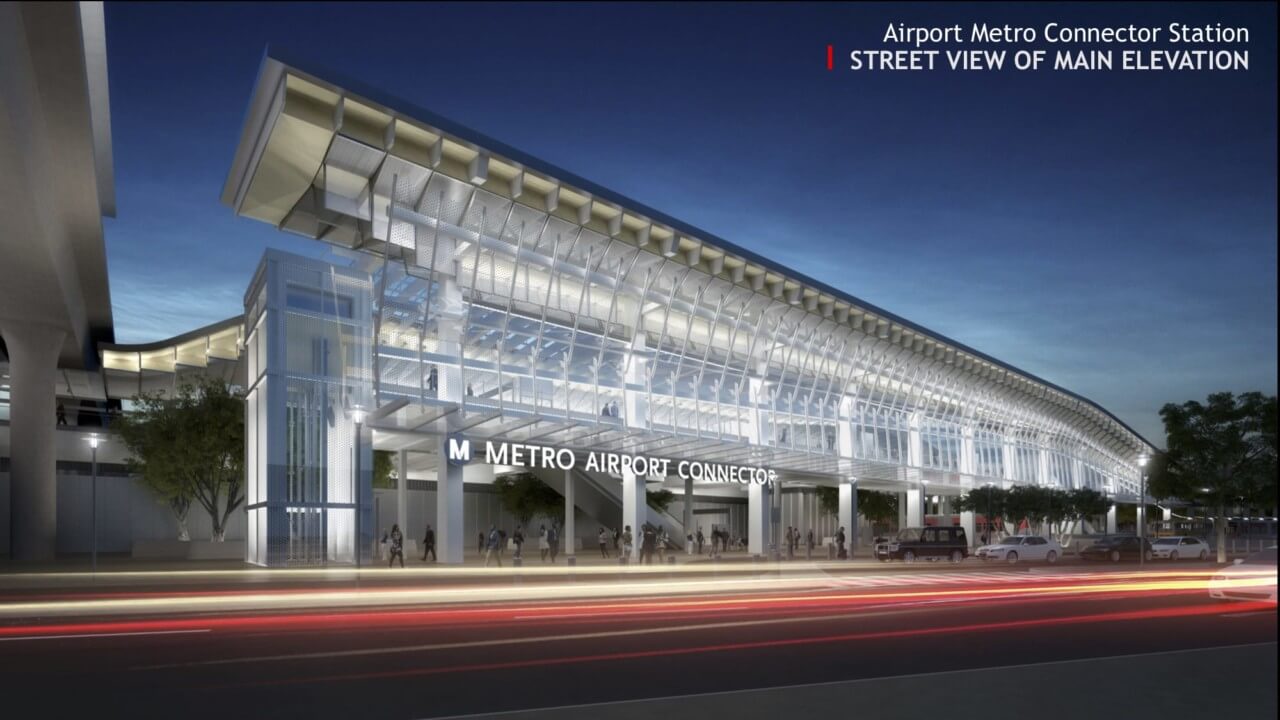 a long light rail station with a Airport Metro Connector Station sign