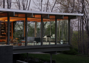 The luss house, a midcentury modern home cantilevering over the woods