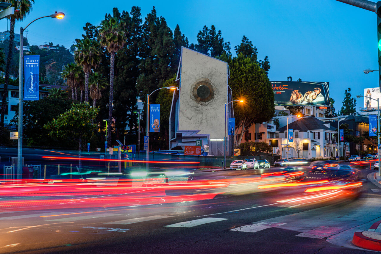 artwork of a concrete street shown on the LED billboard of wiscombe's sunset spectacular