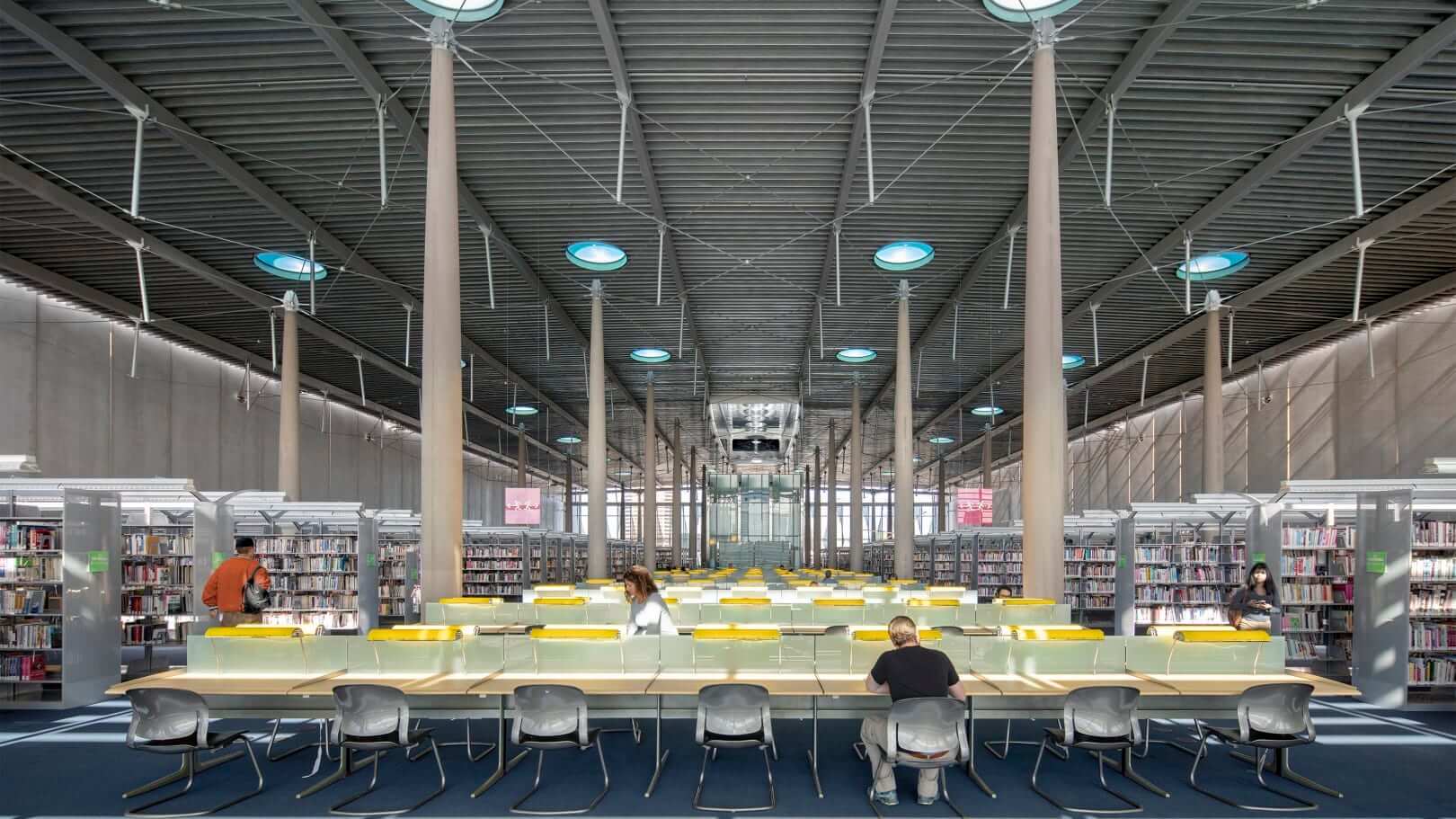 a large open reading room at a library