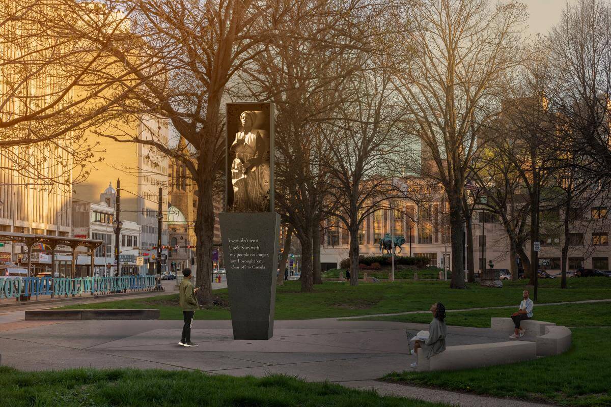 rendering of a monument to harriet tubman in a leafy park