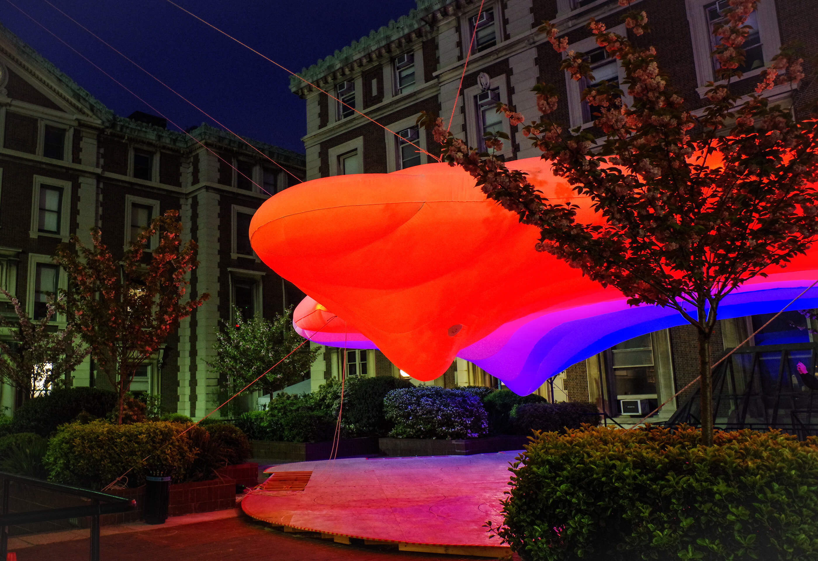 The inflatable avery spot looking north, in red at night