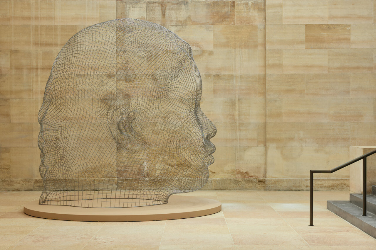 a monumental wire sculpture of a head