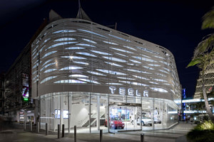 A tesla showroom appointed in novum glass