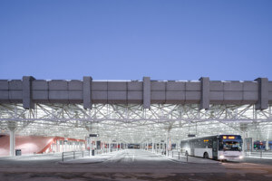 A restored brutalist bus terminal supported by steel trusses