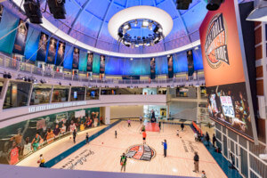Interior image of the Naismith Memorial Basketball Hall of Fame and it's basketball court