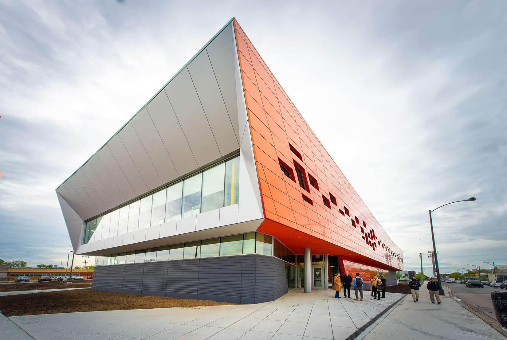 photograph depicting the exterior of a wellness campus in Chicago with an orange facade