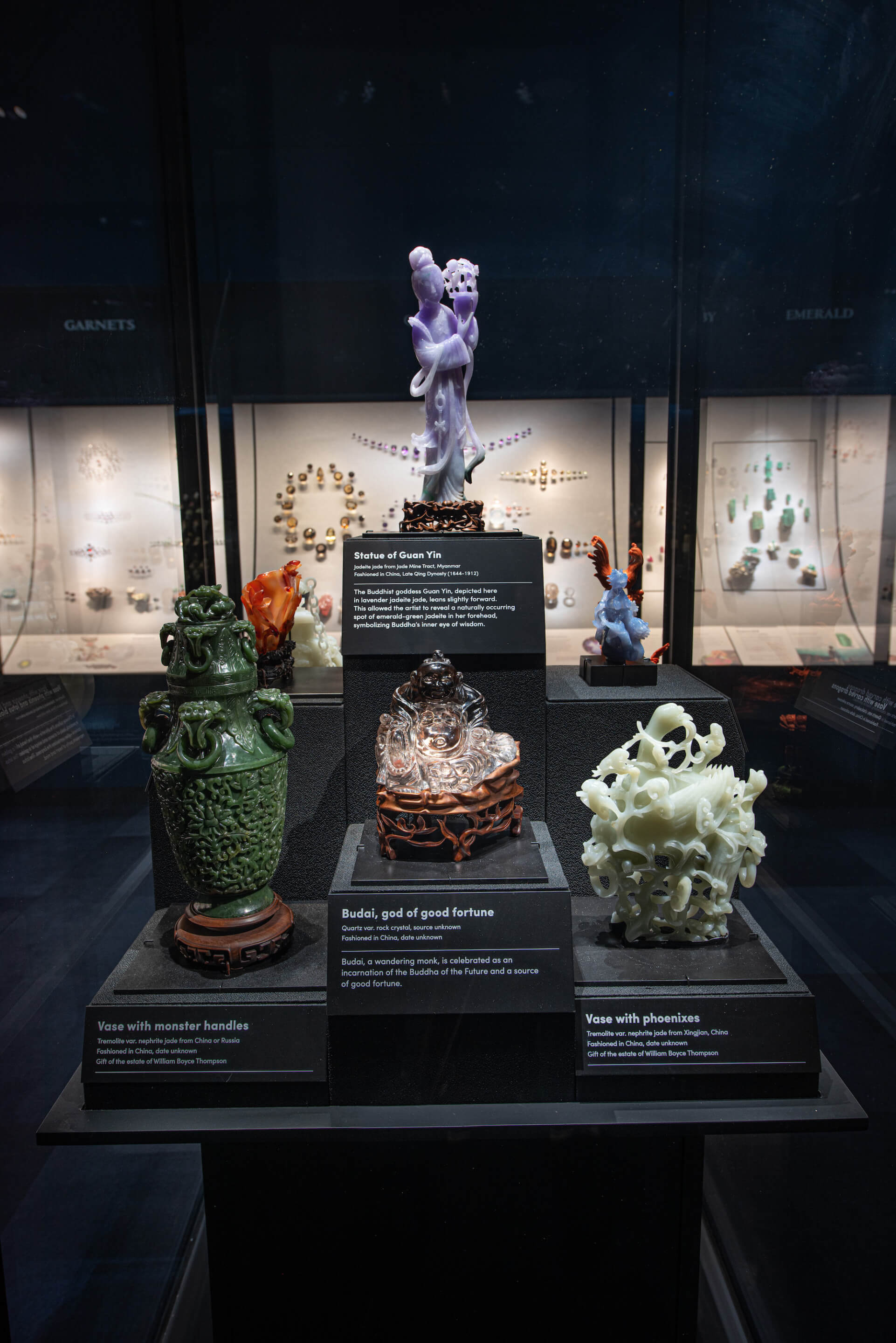 a collection of gem carving and small statues