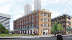 rendering of a long brick building with a Centre Pompidou × Jersey City sign
