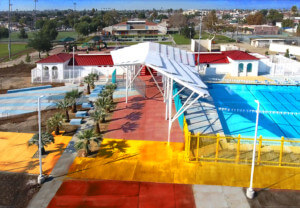 aerial view of a colorful swimming pool complex, the algin sutton pool