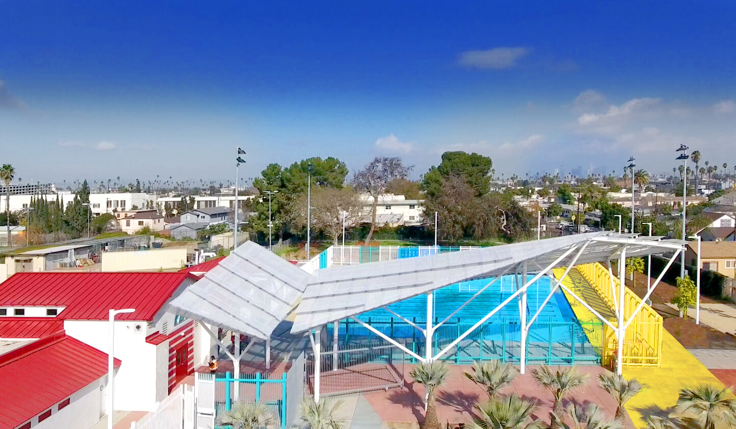 overhead view of a colorful swimming pool complex in la