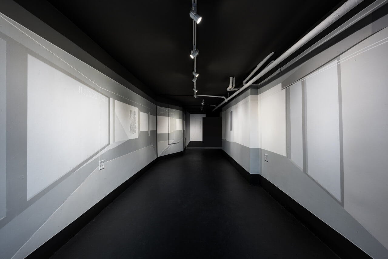 Looking down a long narrow gallery for Linee Occulte: Drawing Architecture