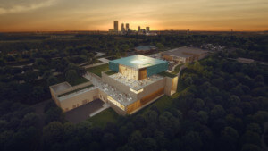 aerial illustrated view of a museum building at sunset with a skyline in the distance