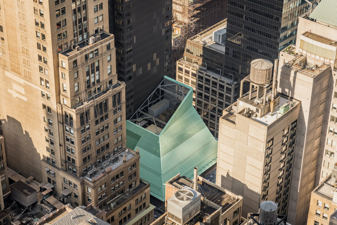 aerial view of a manhattan building with an angular roof feature