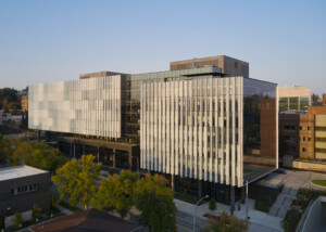image of the building at sunset, the Hans Rosling Center, clad in glass fins