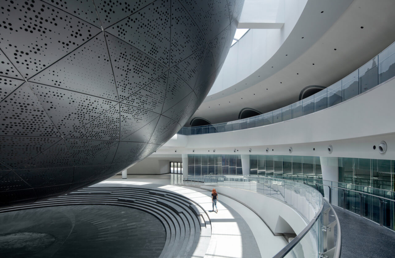 a large spherical space within a museum building