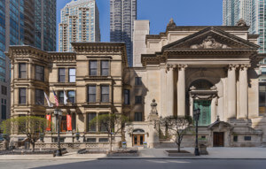 a historic chicago auditorium flanked by a gilded age mansion
