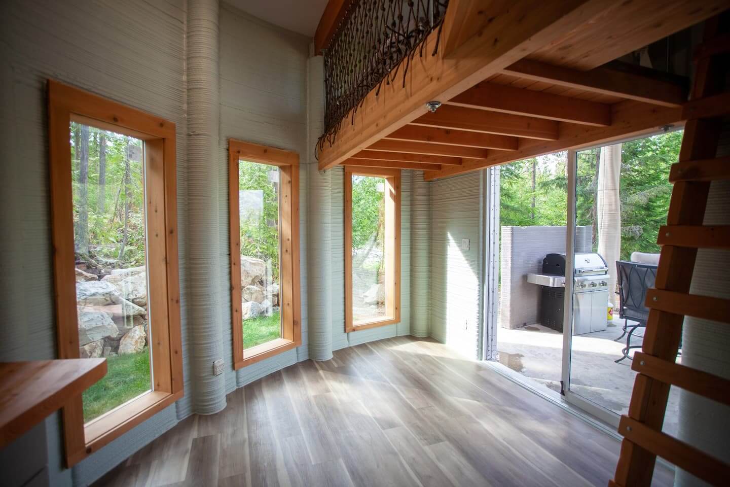 interior of a 3d-printed home with wood finishes