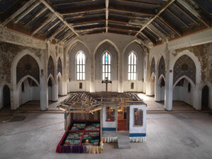 A recreation of several structures inside of an abandoned church