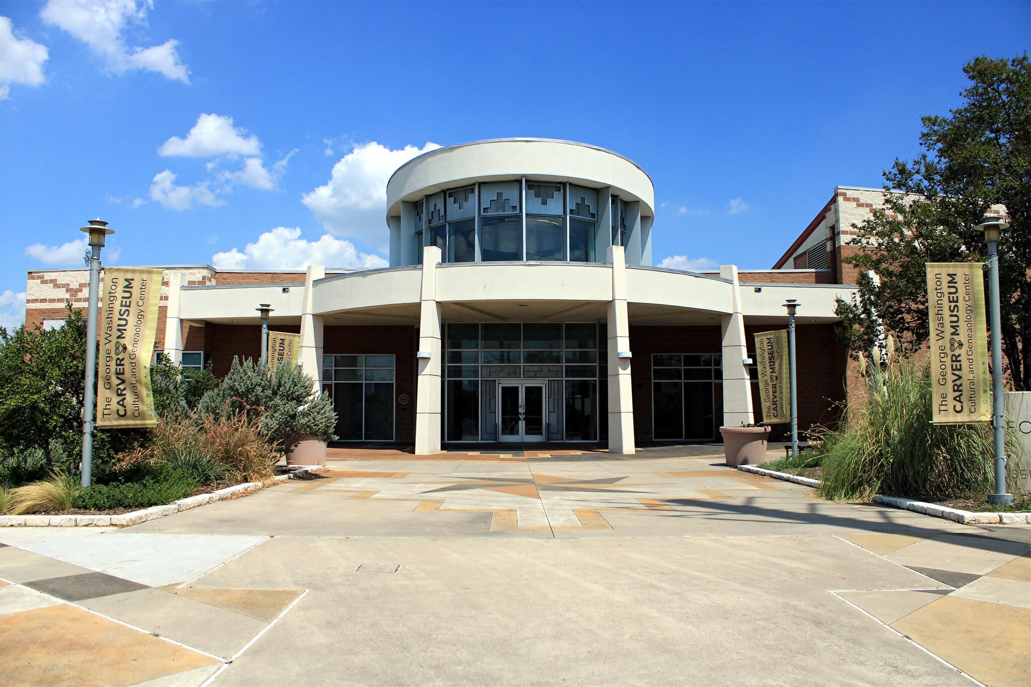 exterior of a museum and entrance plaza of the George Washington Carver Museum