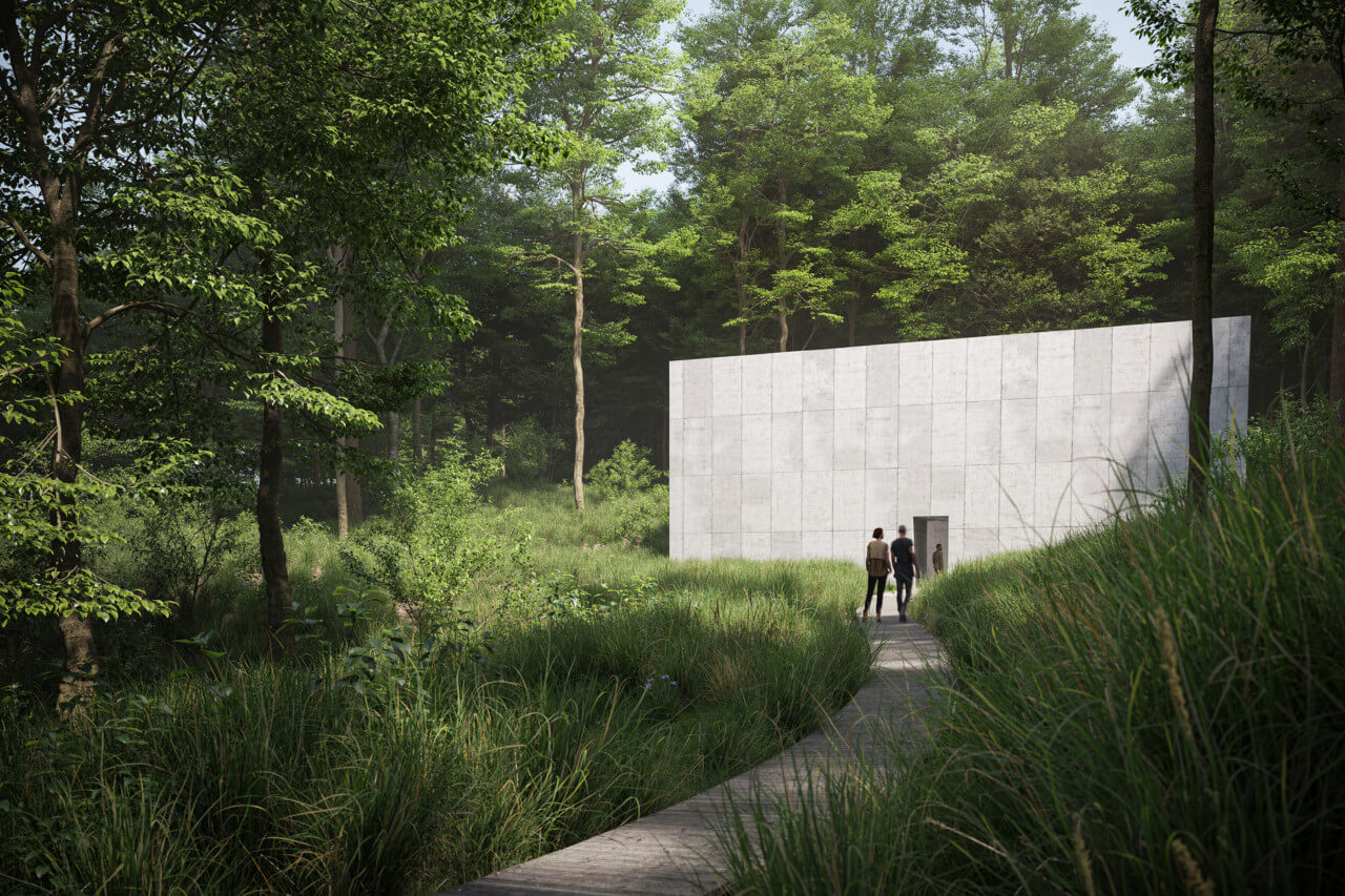 Approaching a concrete cube nestled in woodland