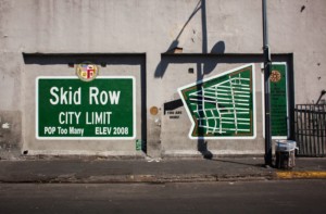 A stenciled skid row sign complaining about homelessness in los angeles