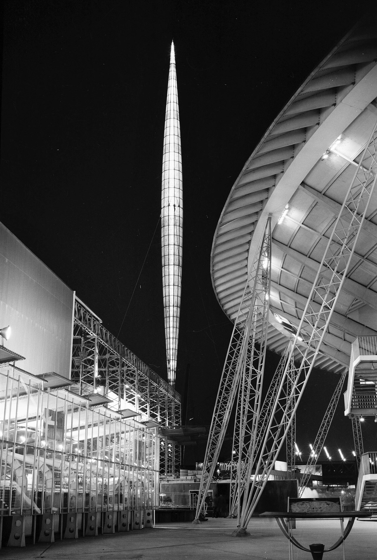 Black and white photo of a tower and tall spire
