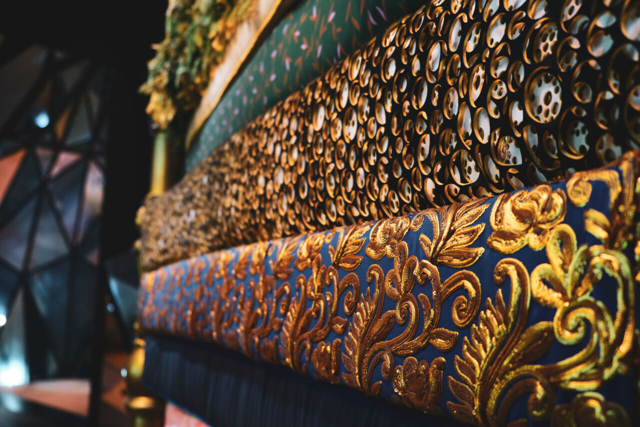 a stack of ornate mattresses