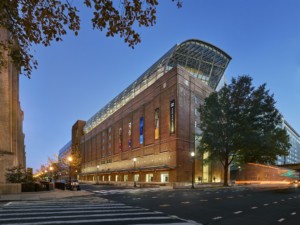 The Museum of the Bible in Washington, D.C., was forced to return 12,000 looted artifacts to Iraq. the museum building is brick with a glass topper
