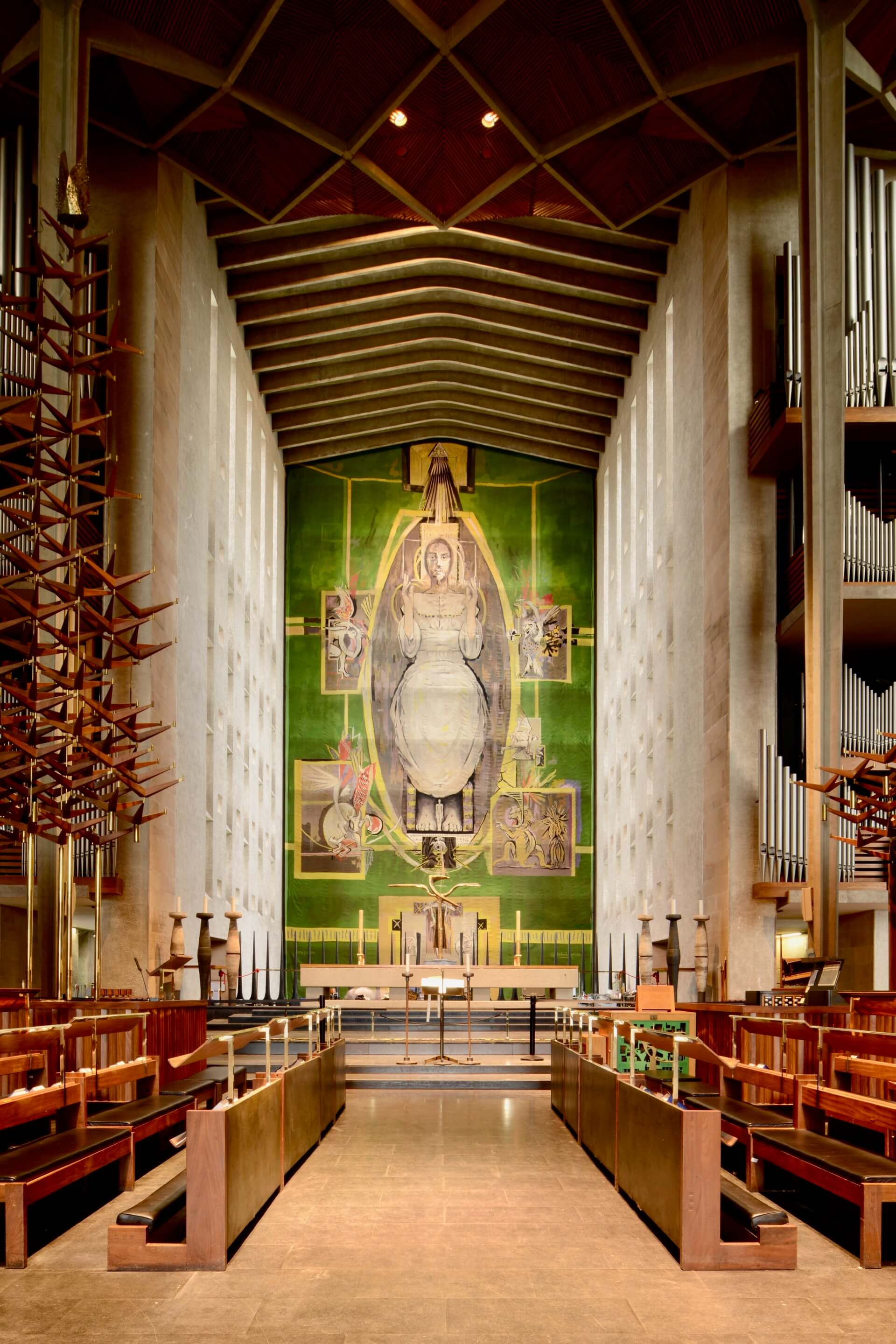 interior photo of a long, tall mid-century modern church in britain