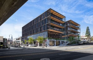 Rendering of a timber office building designed by lever with two rectangular hemispheres