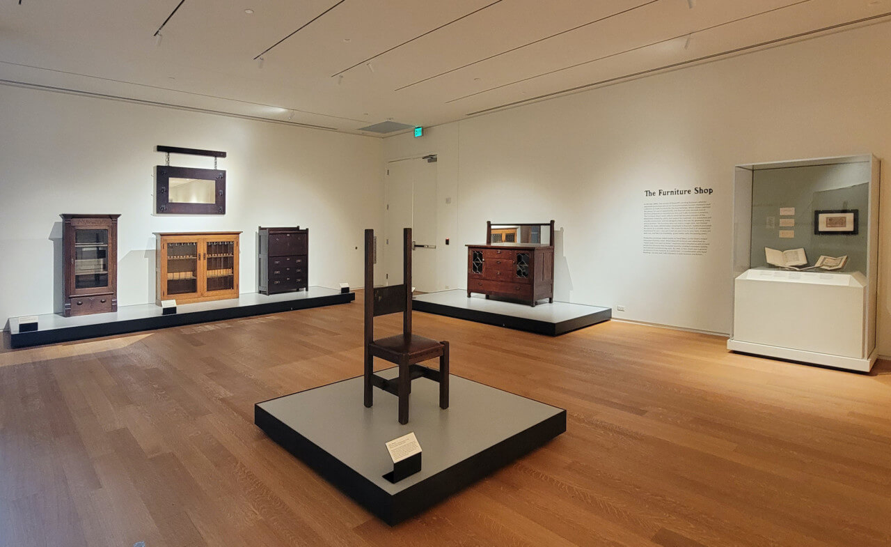 view of a chair on display in a museum gallery