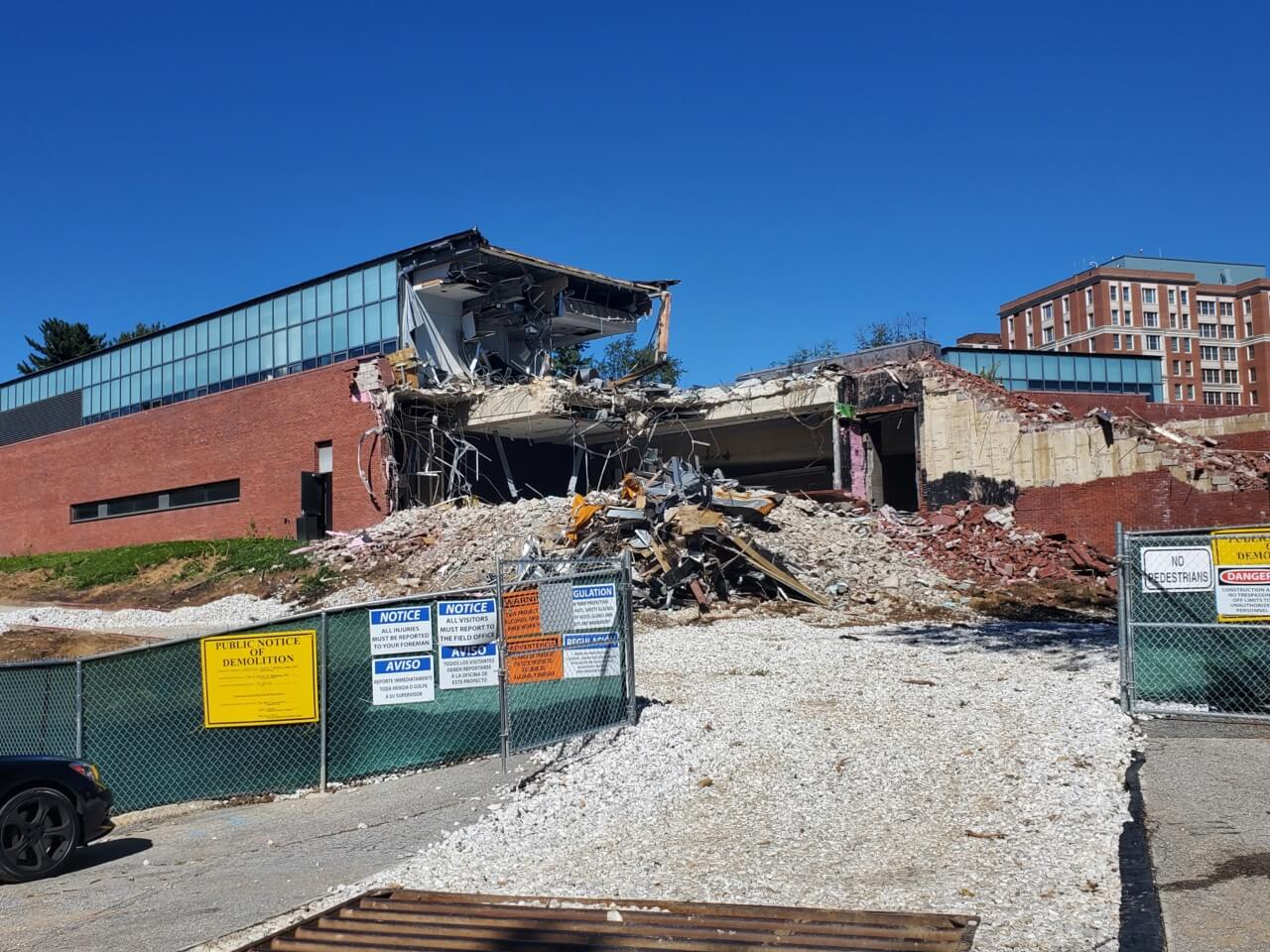 A photo of the brick Mattin Center being torn down