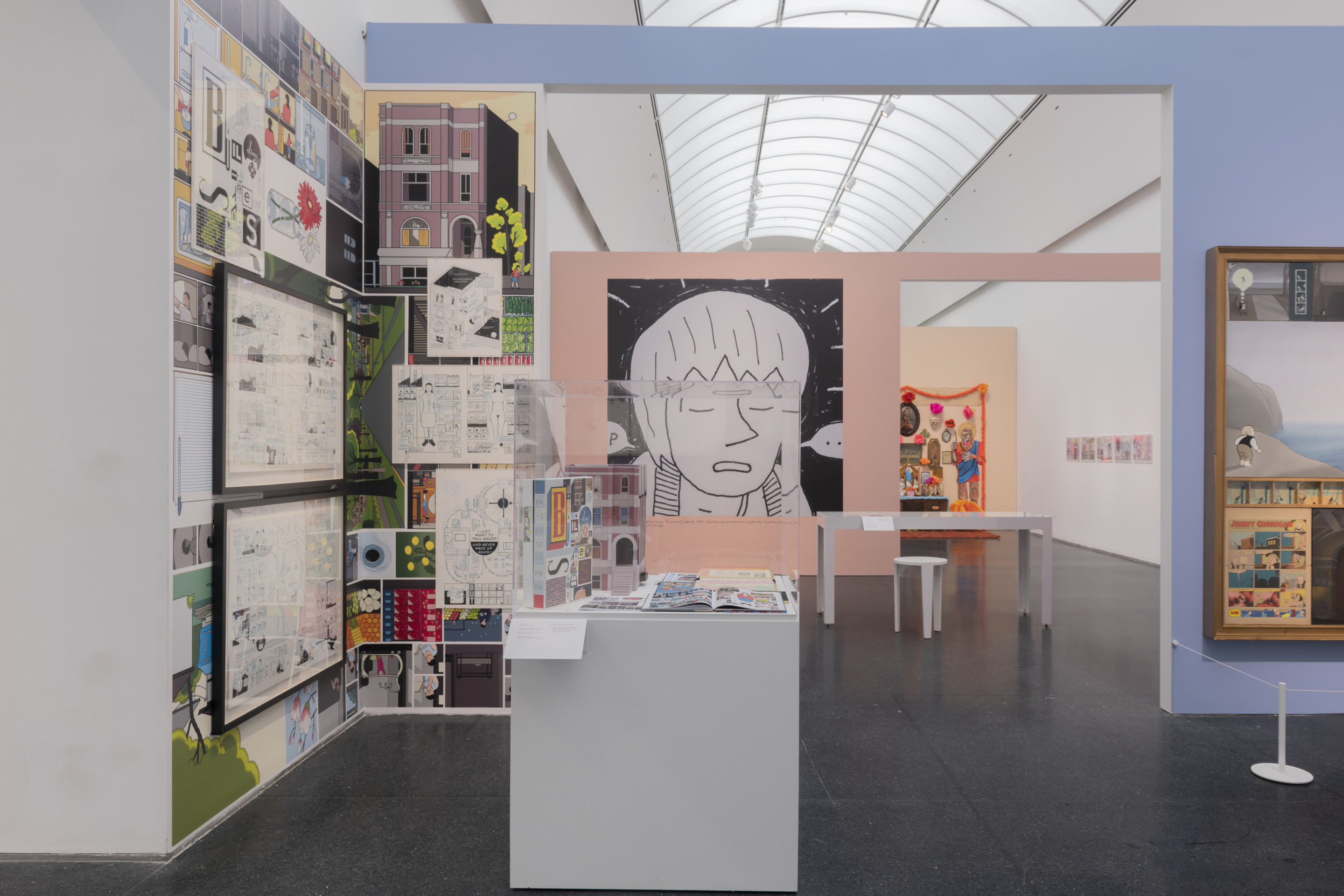 picture of a museum gallery with assorted artworks and illustrations for the Chicago Comics show