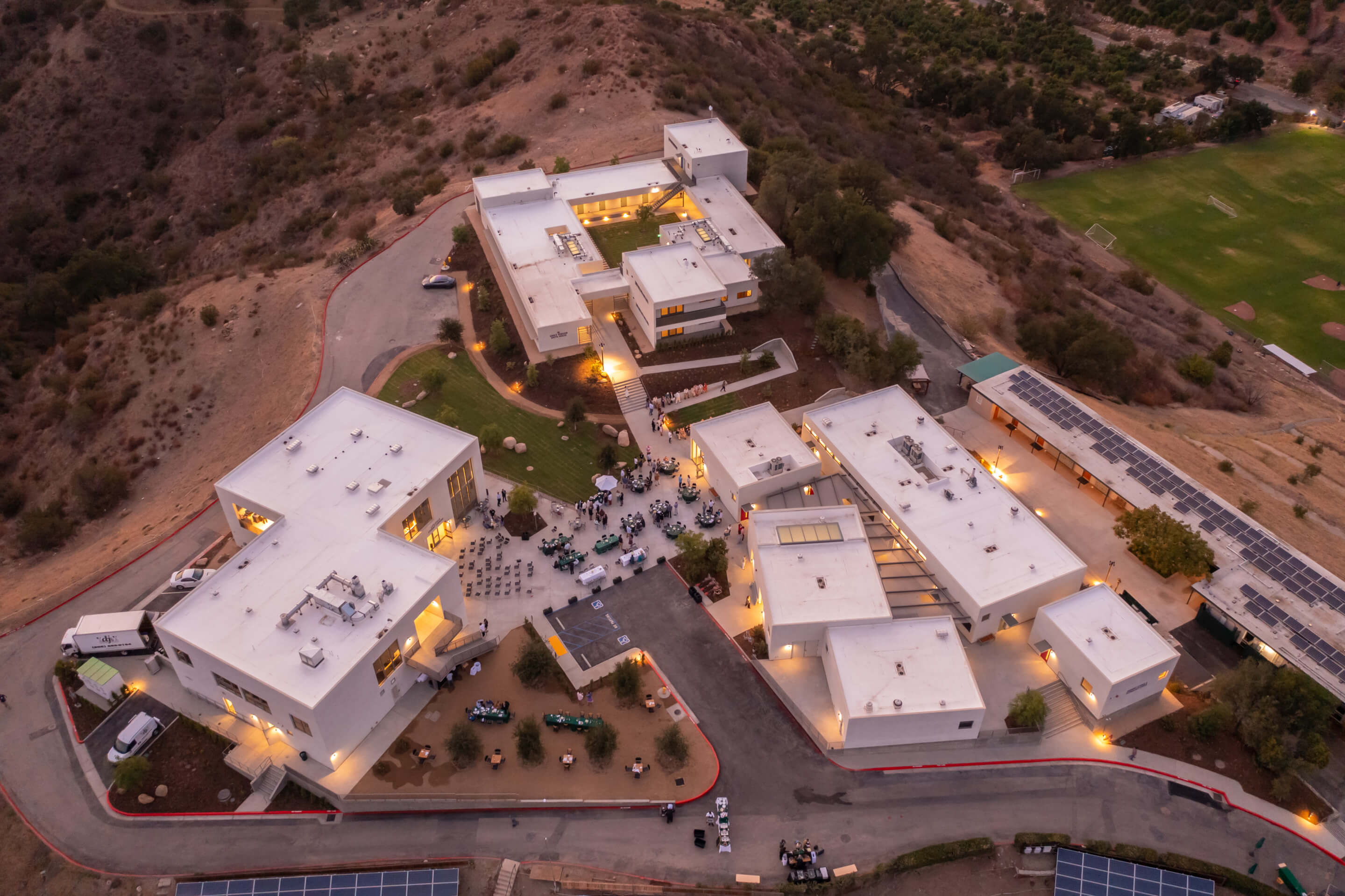 Aerial view of the ojai valley school and its three boxy buildings