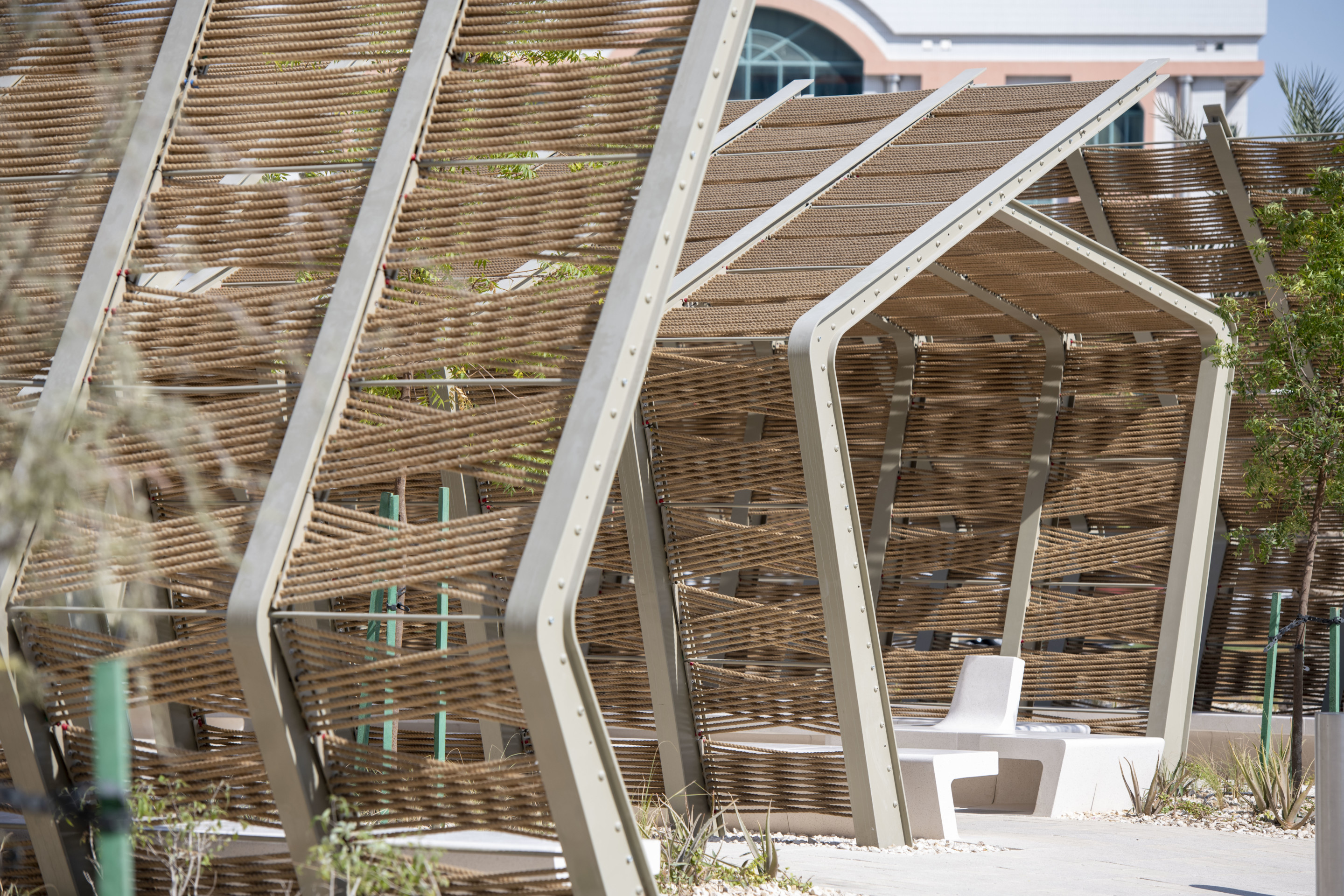 Timber wrapped shading pavilions designed by Kishore Varanasi