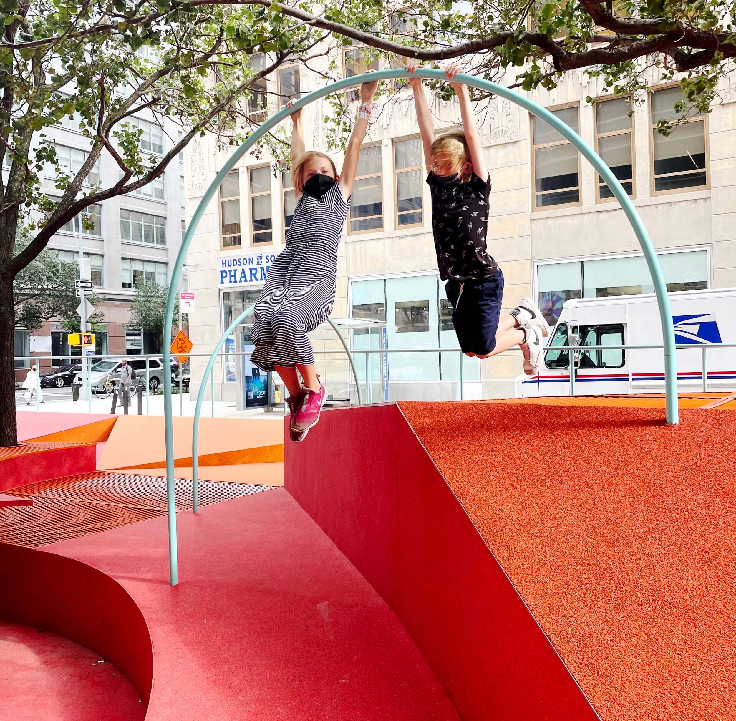 children playing in a temporary urban play space