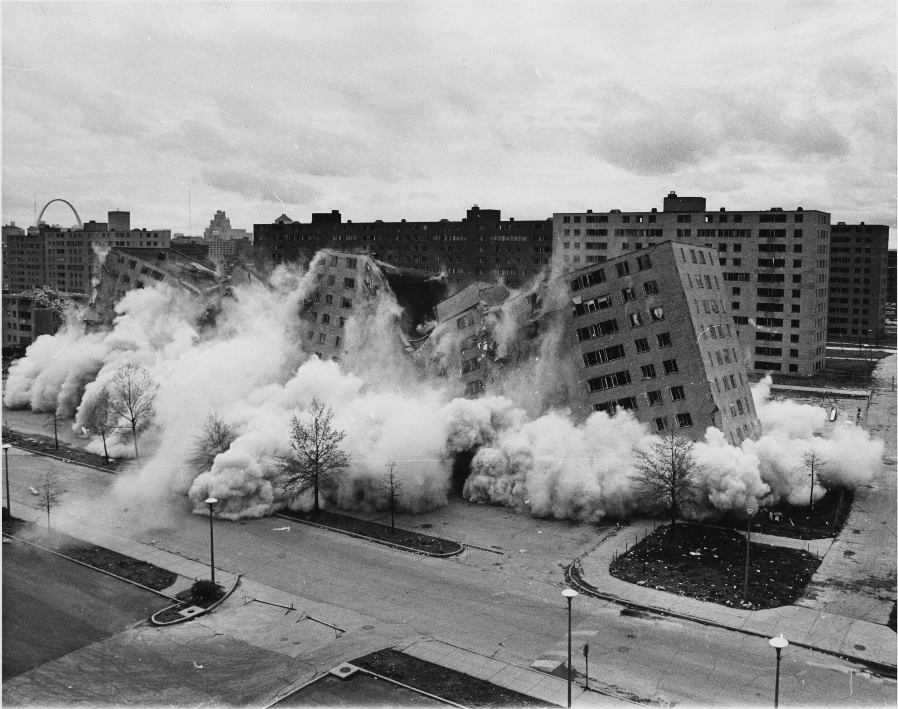 the demolition of the pruitt-igoe housing complexes, one of many projects by minoru yamasaki that was ultimately demolished