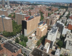 An aerial photo of sendero verde, an affordable housing block under construction in brick