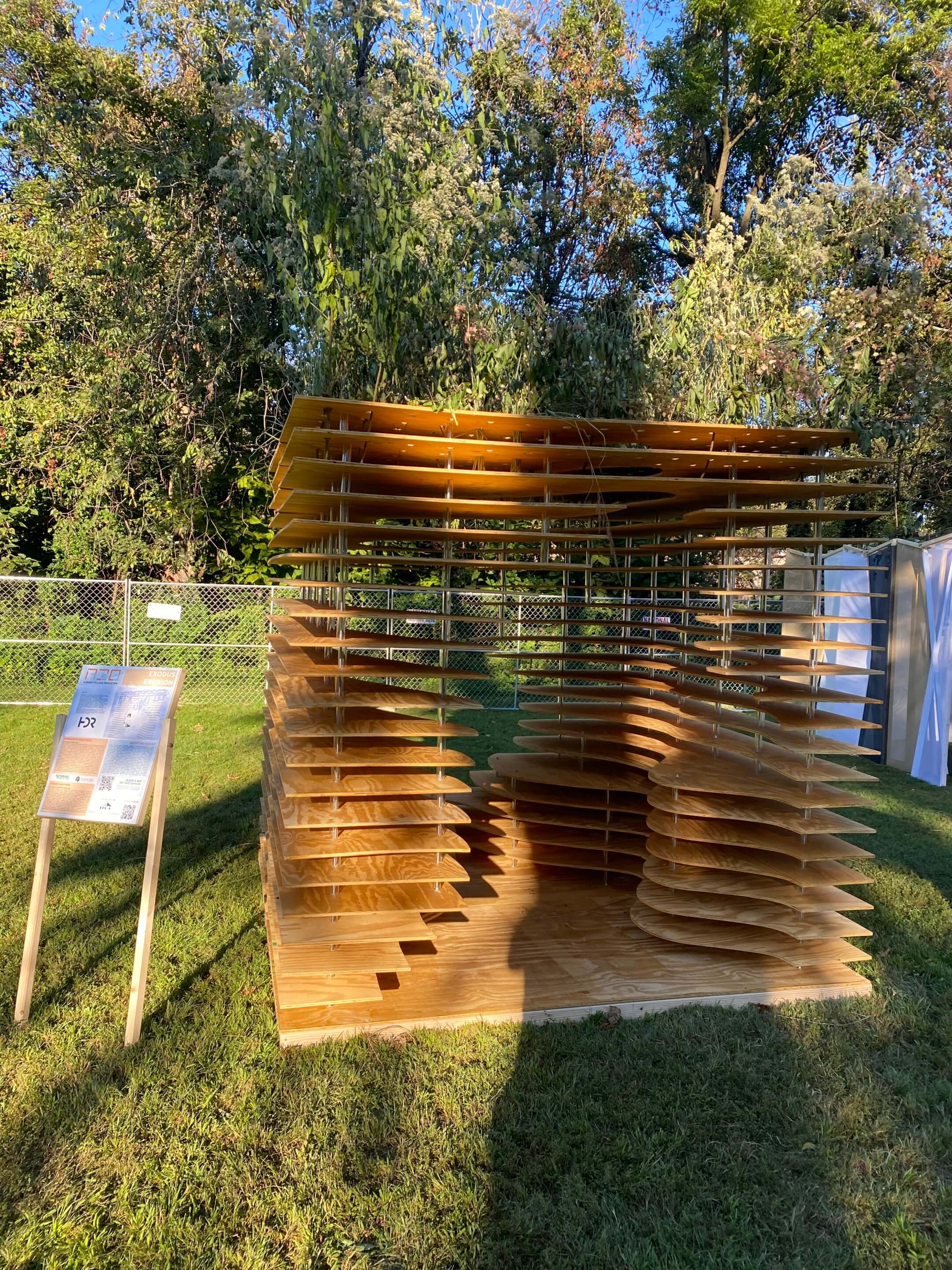 a wooden sukkah on display