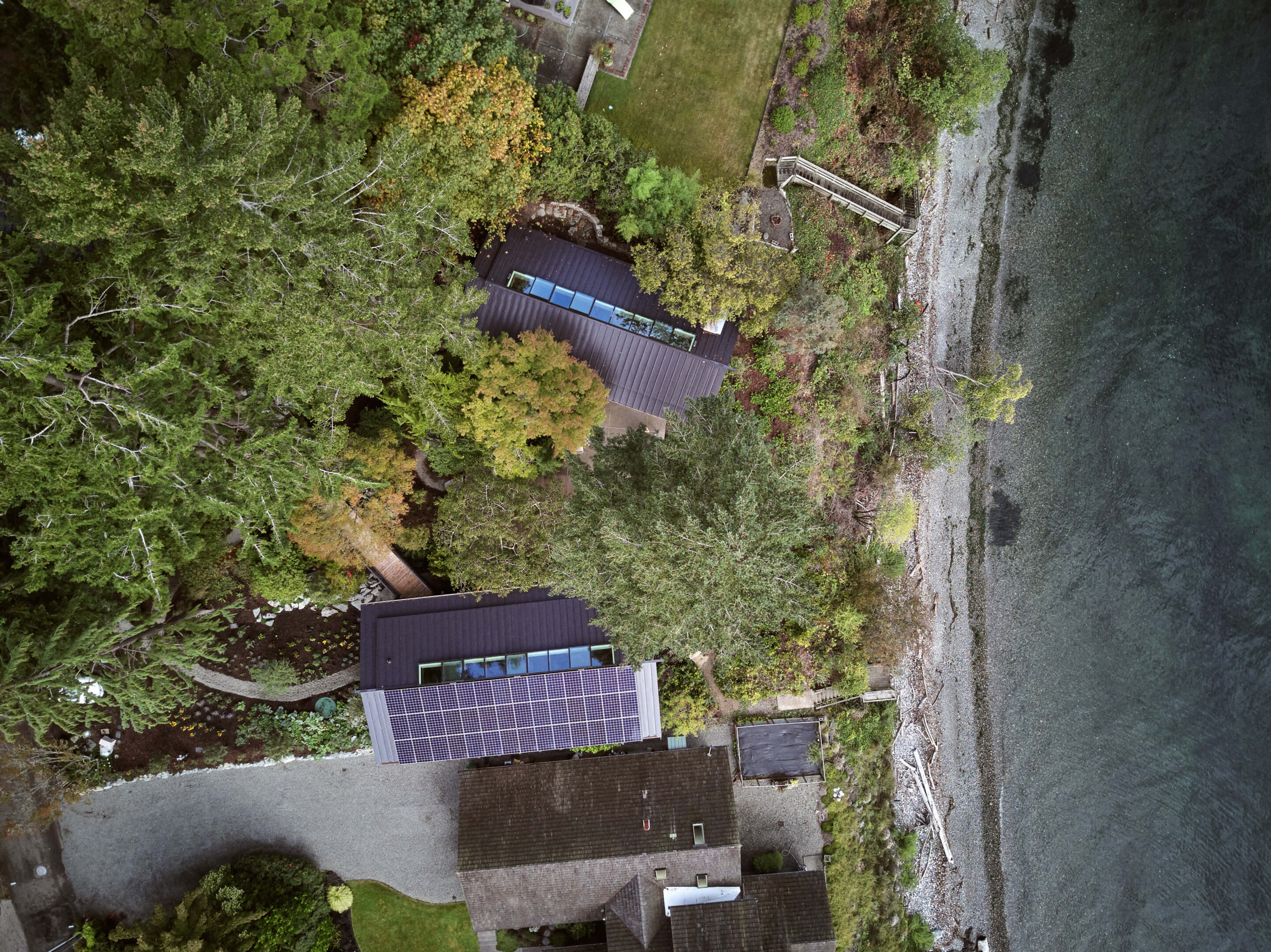 aerial view of a home perched on a cliff