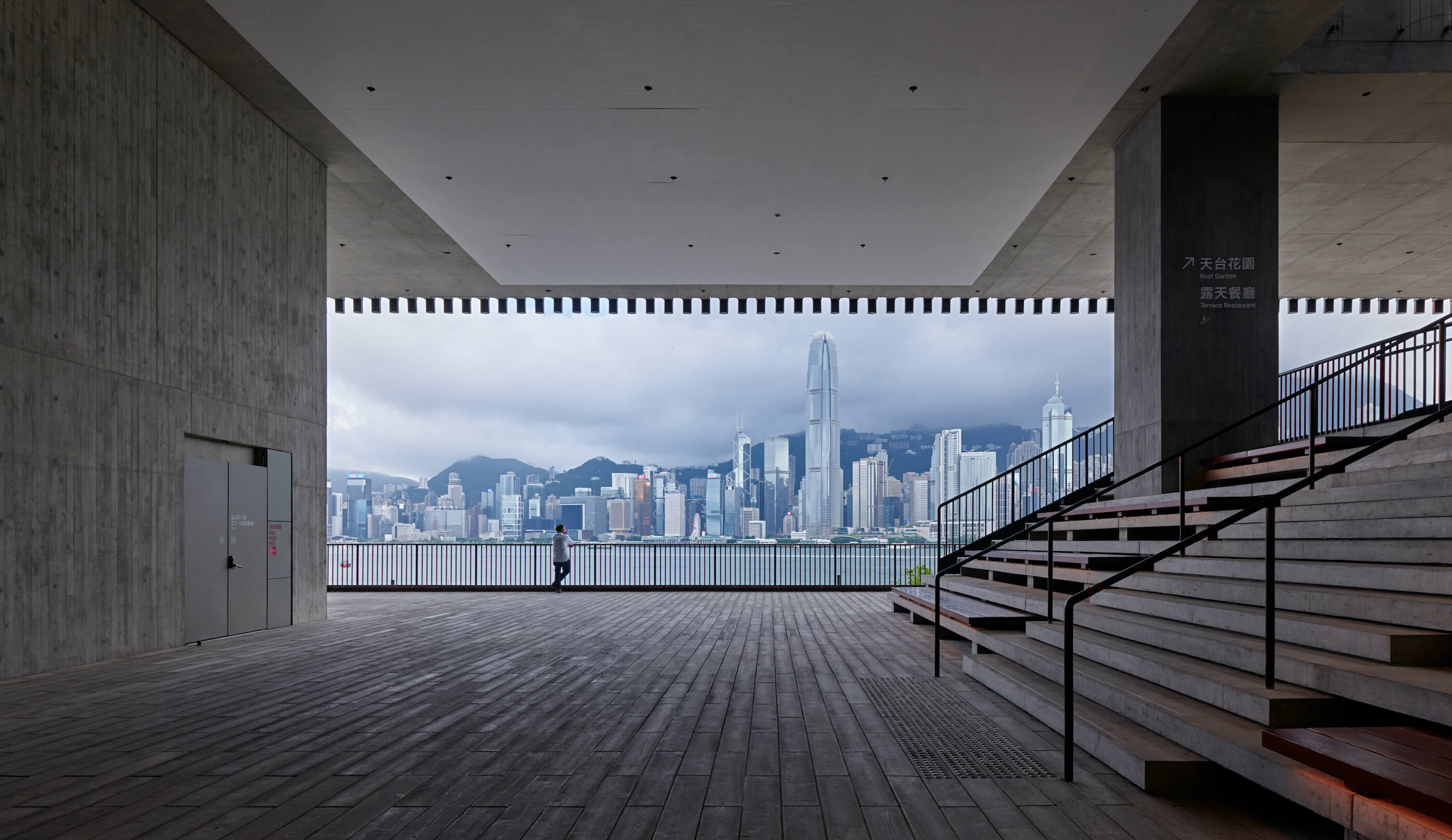 view of hong kong skyline from a museum terrace