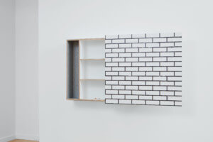 A display at volume gallery of a white brick installation