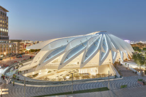 an expo pavilion with a finned roof structure at Expo 2020 Dubai