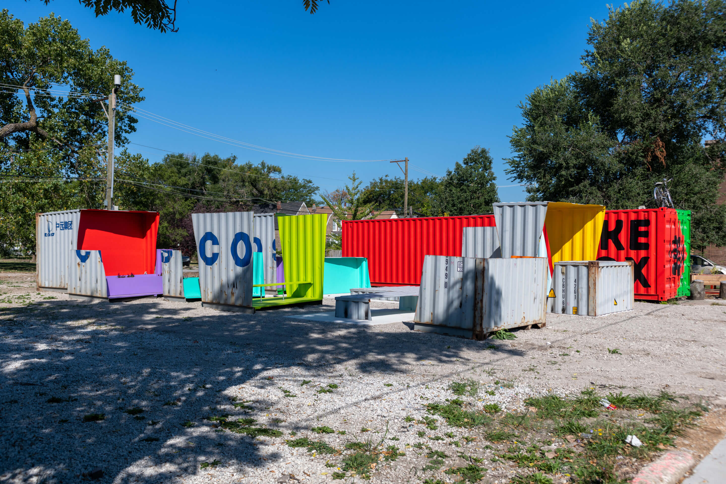 At The Available City, a row of colorful metal walls